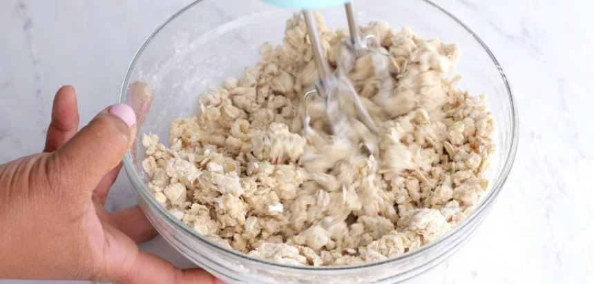 Oat mixture added to butter mixture.