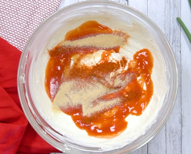 Other ingredients added to cream cheese mixture.