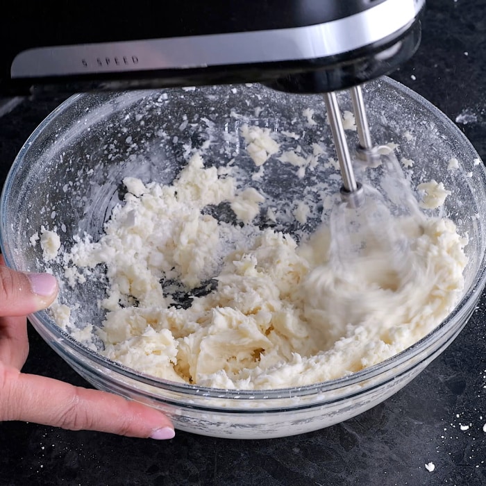 Mixing the frosting.