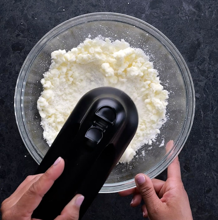 Creaming butter and sugar.
