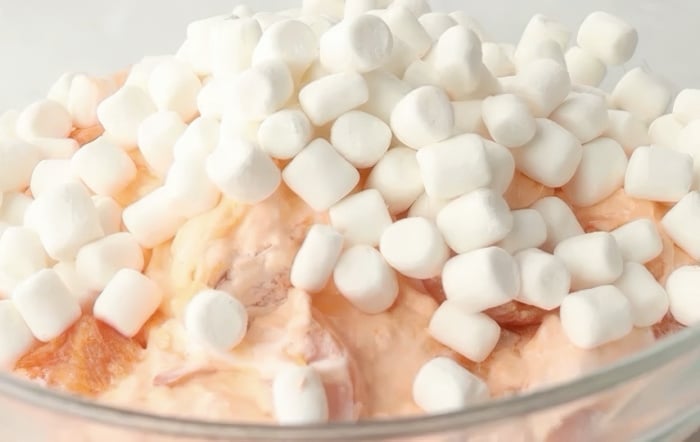 Adding the marshmallows.