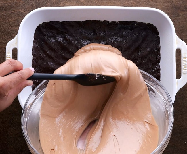 Transferring the batter.