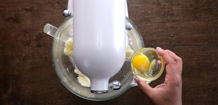 Adding the eggs.