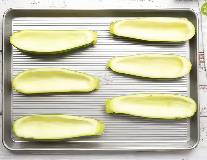 Zucchini on baking sheet.