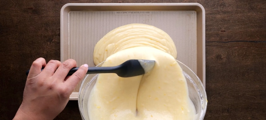 Pouring the batter into sheet pan.