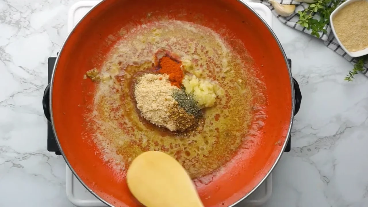 Making pork chop glaze in skillet.