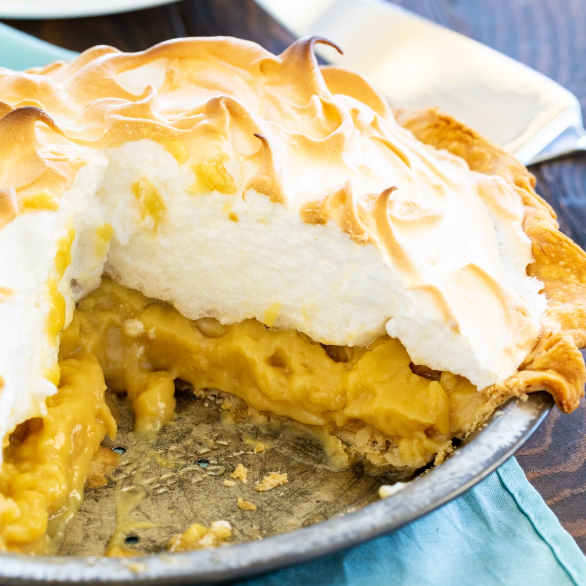 Butterscotch Pudding Pie with a slice cut out.