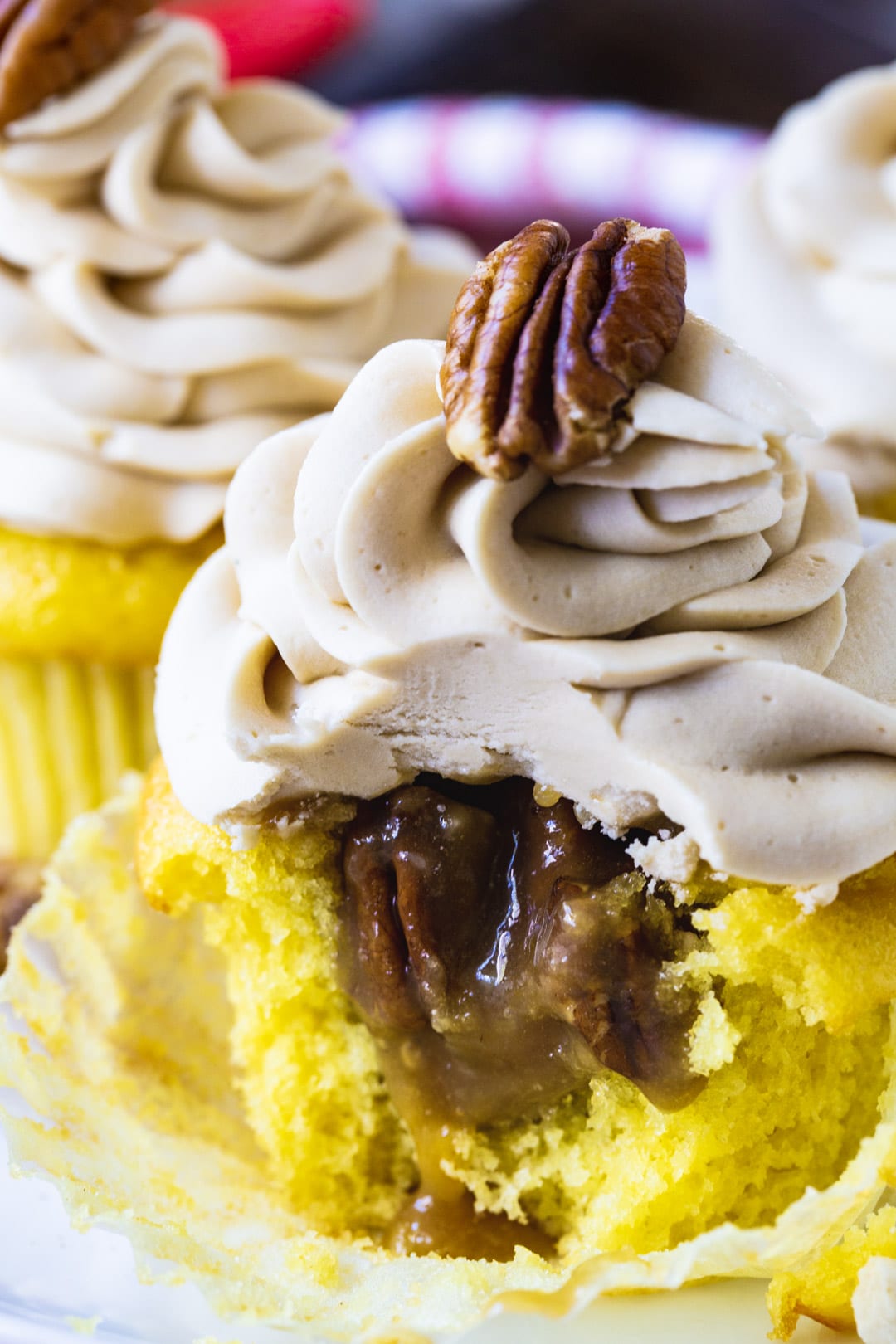 Pecan Pie Cupcake with bite taken out to show inside.