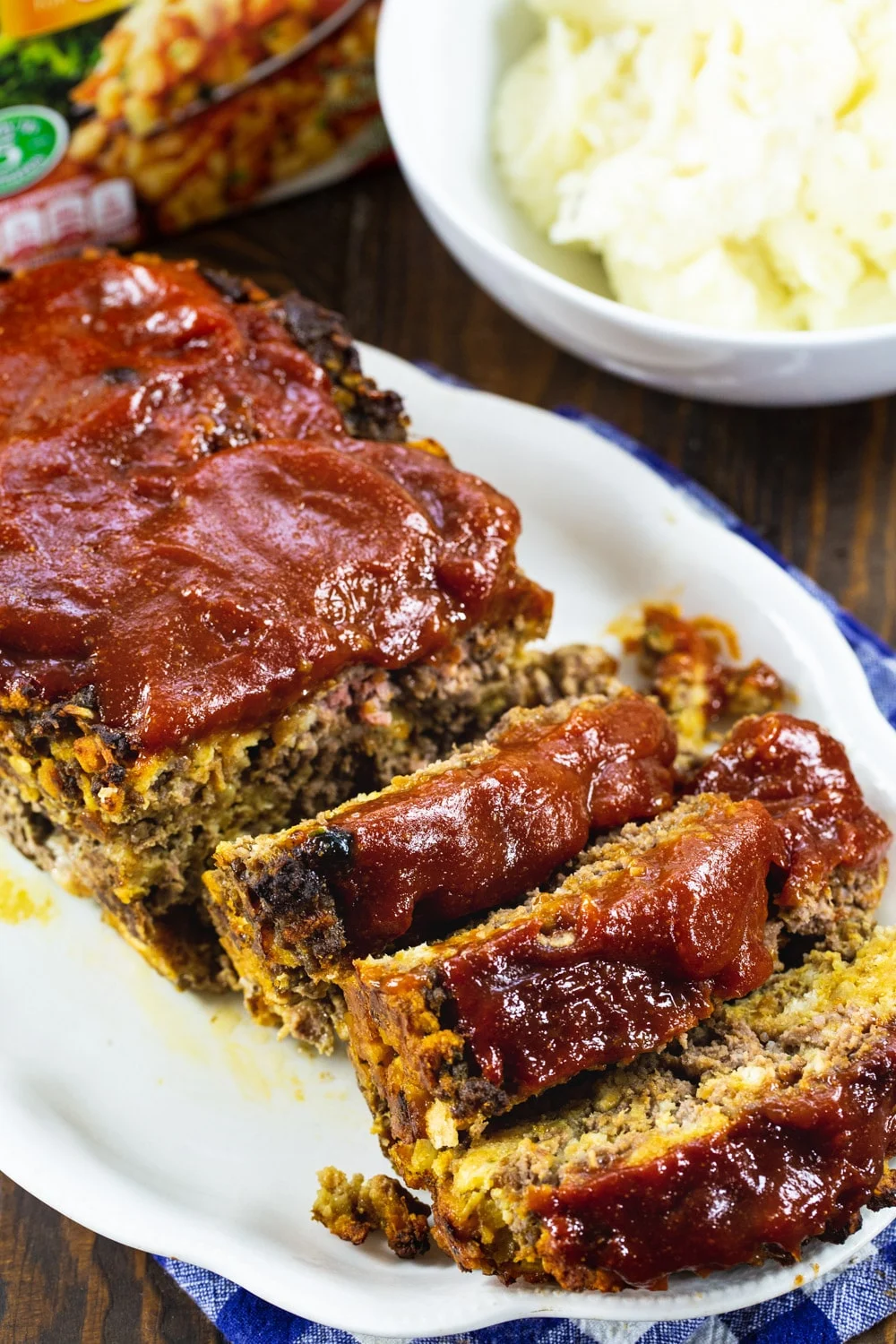 Stove Top Meatloaf cut into slices on a serving platter.
