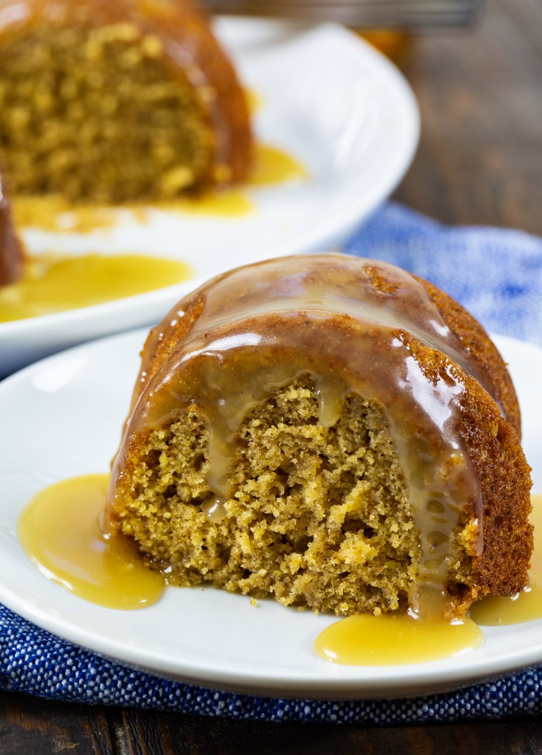 Butternut Squash Cake with Bourbon Glaze slice on a plate.