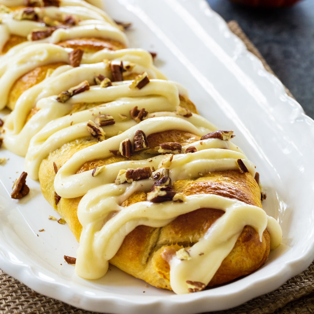 Pumpkin Crescent Braid covered with cream cheese glaze.