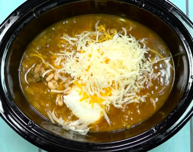 Shredded cheese added.
