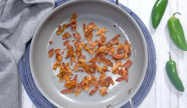 Cooking the bacon.
