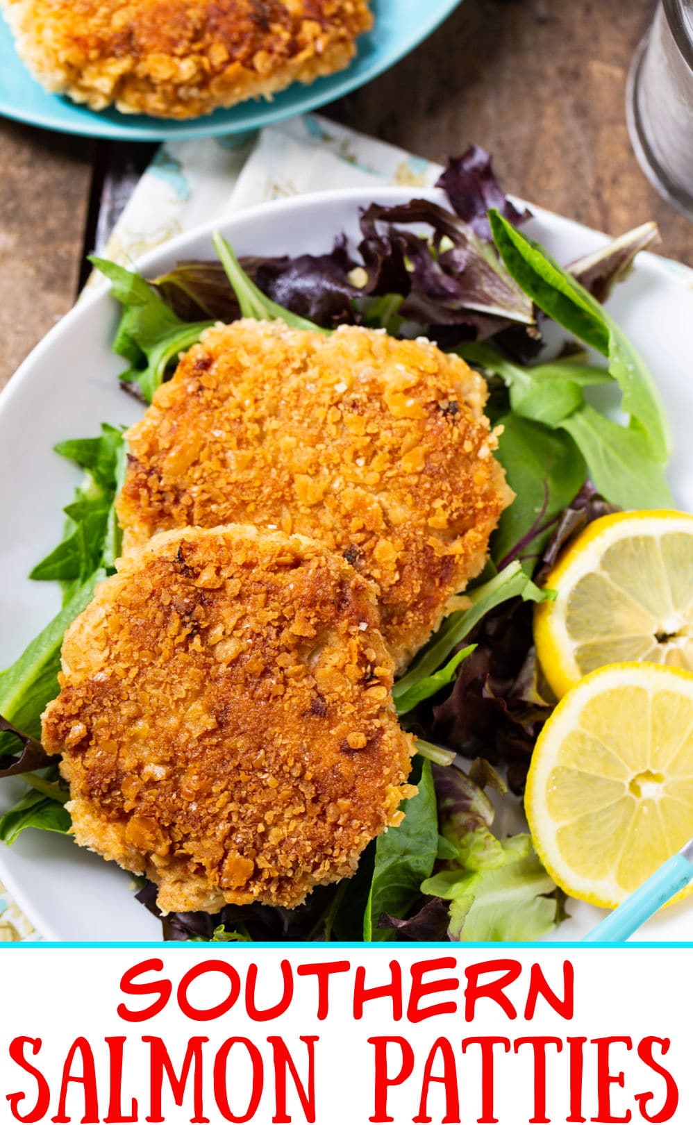 Southern Salmon Patties on top of bed of lettuce.