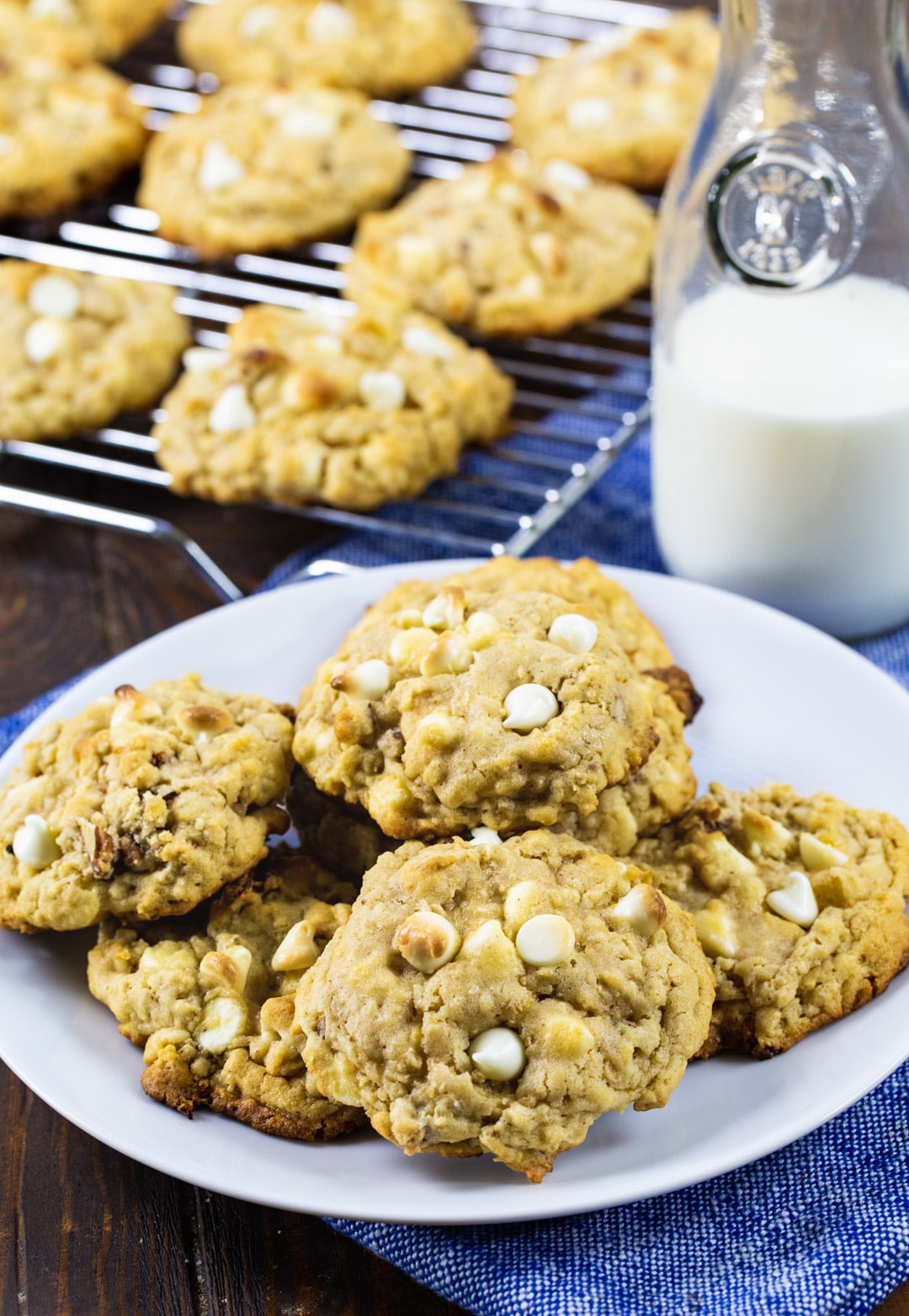 Cookies piled on a plate.
