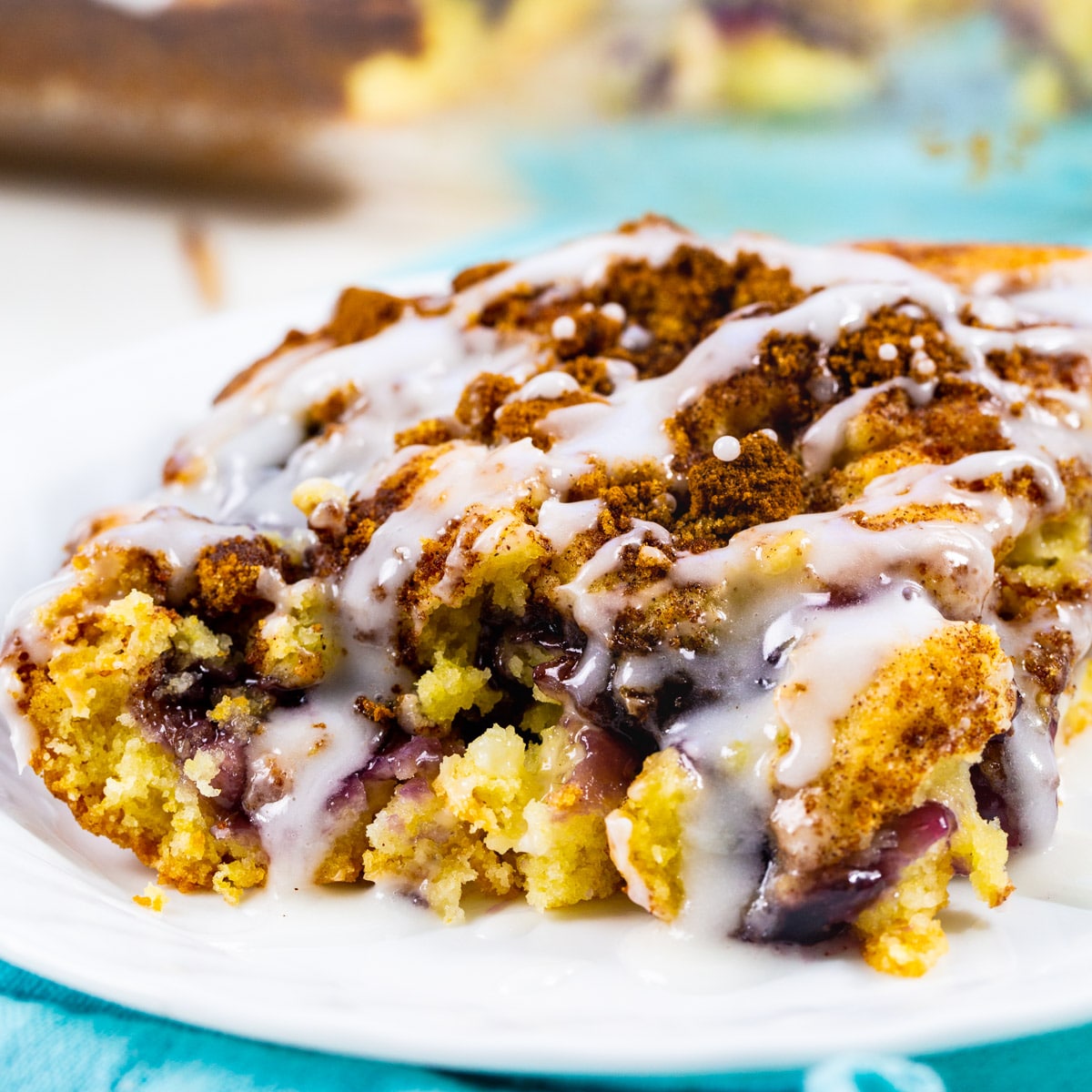 Slice of Blueberry Pie Coffee Cake on a plate.