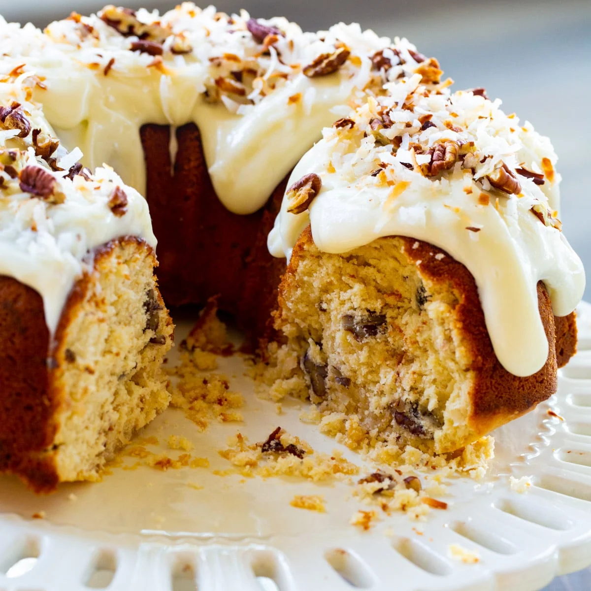 Italian Cream Bundt Cake on a cake stand.