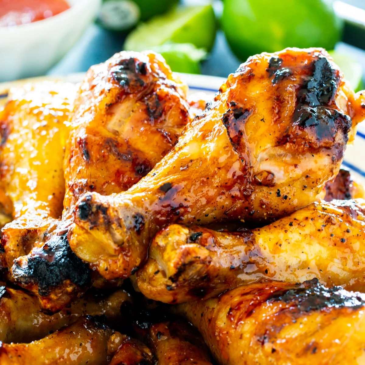 Jalapeno Lime Chicken Drumsticks piled on a plate.