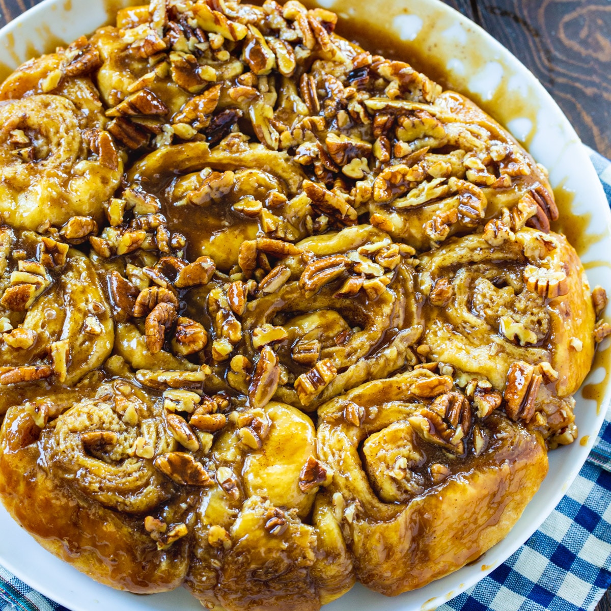Bourbon Pecan Cinnamon Rolls on a plate.