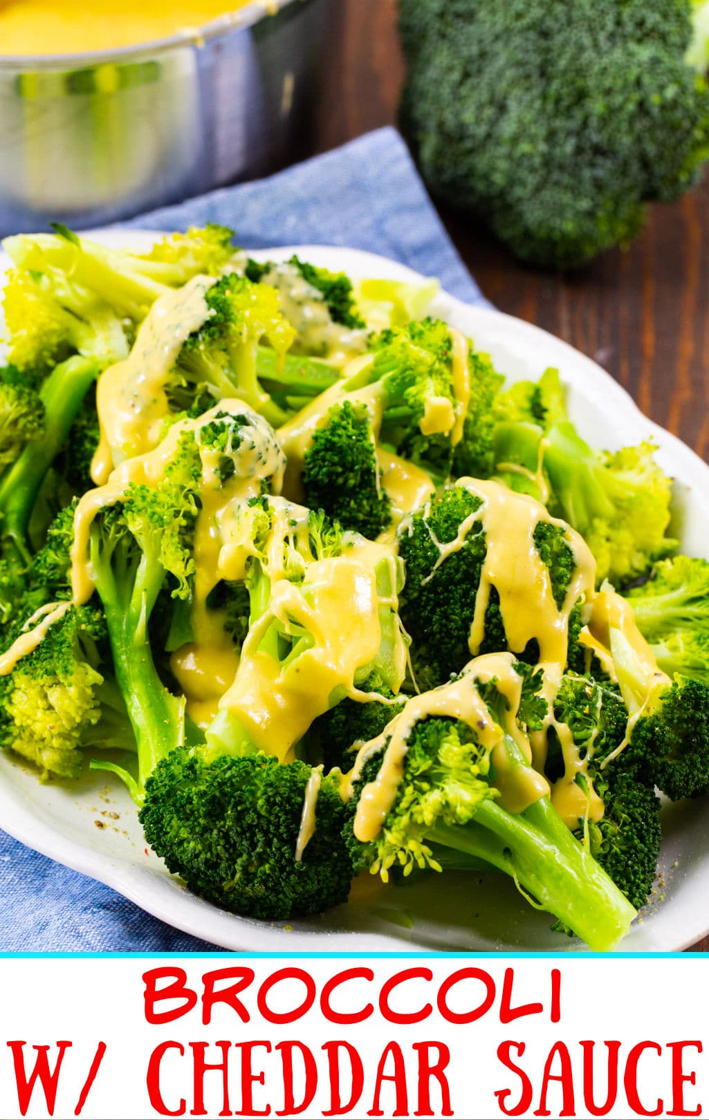 Broccoli with Cheddar Sauce on a serving plate.