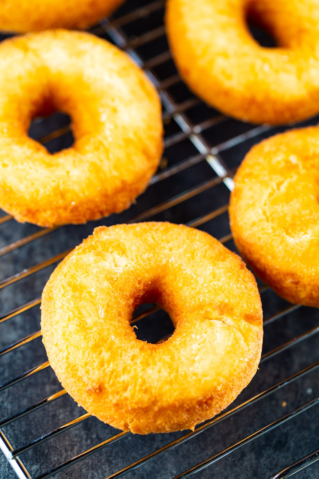 Doughnuts on a wire rack.