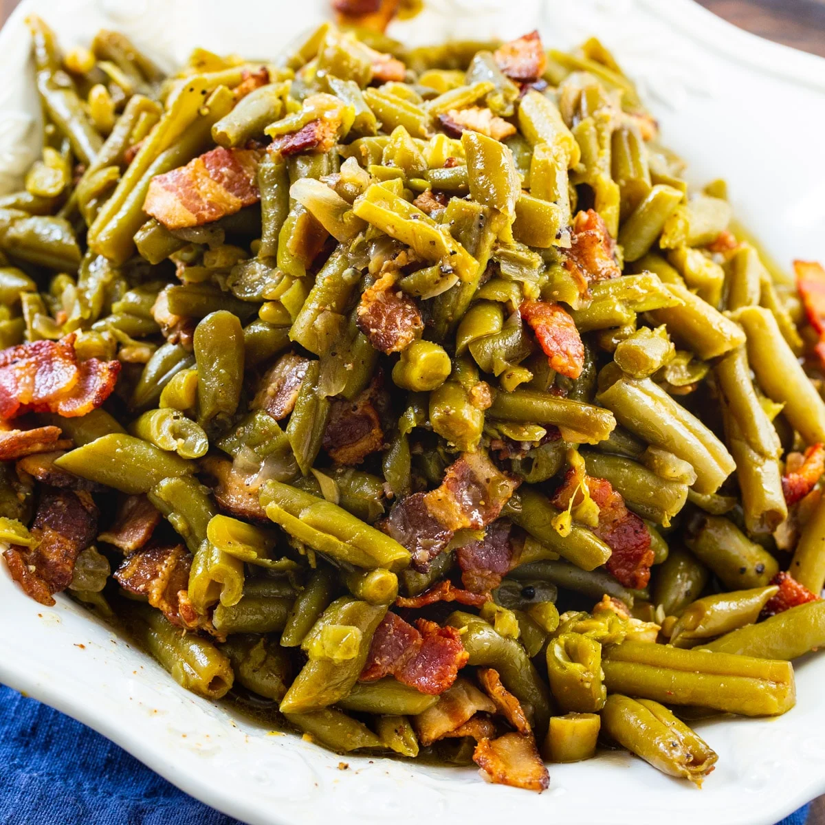 Crock Pot Buttery Bacon Green Beans on a serving dish.