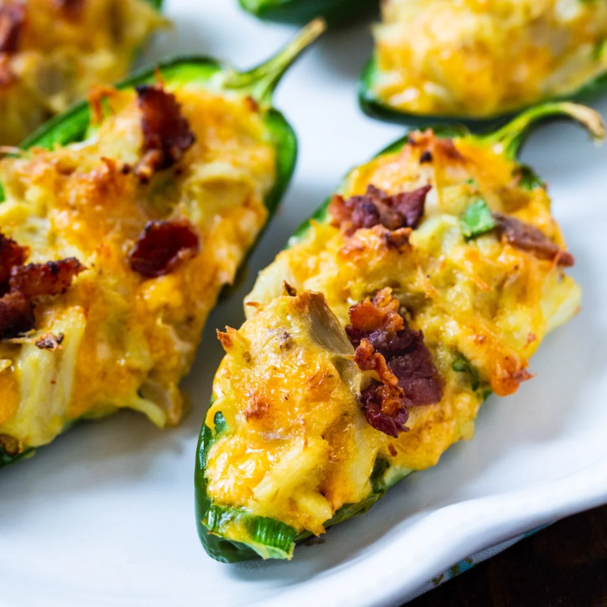 Cajun Crab Stuffed Jalapenos on a plate.