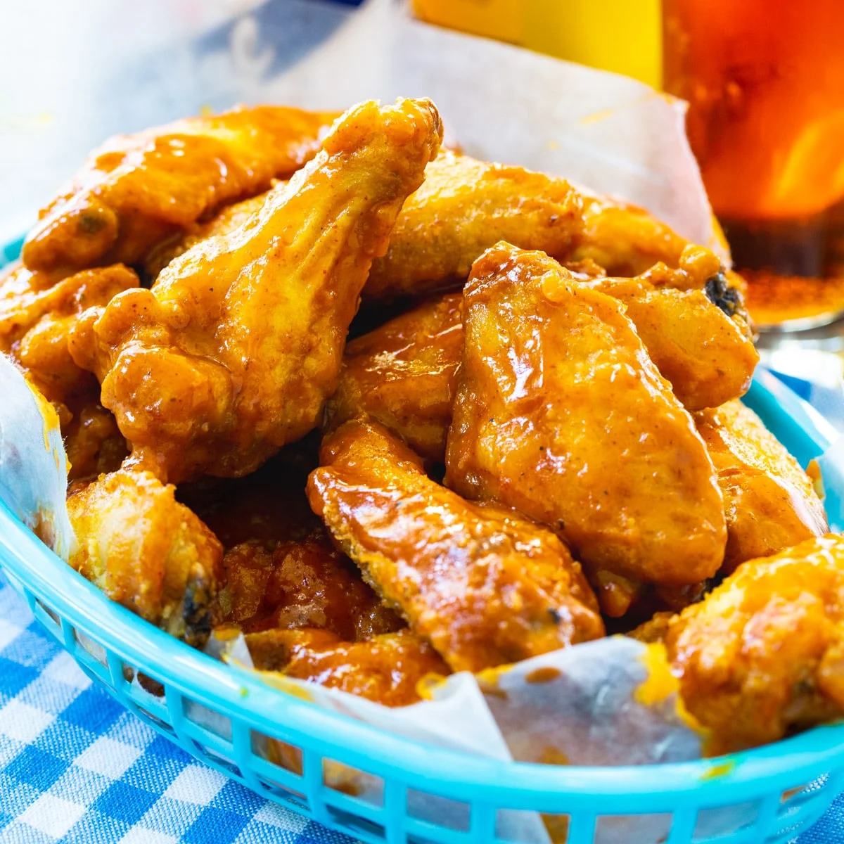 Carolina Mustard Wings in a blue food basket.