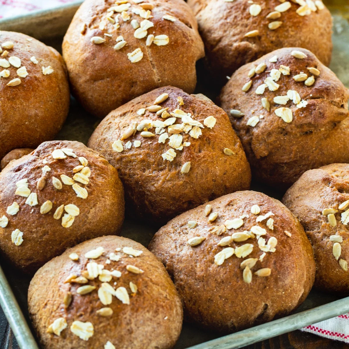 Whole Wheat Molasses Rolls on a baking sheet.