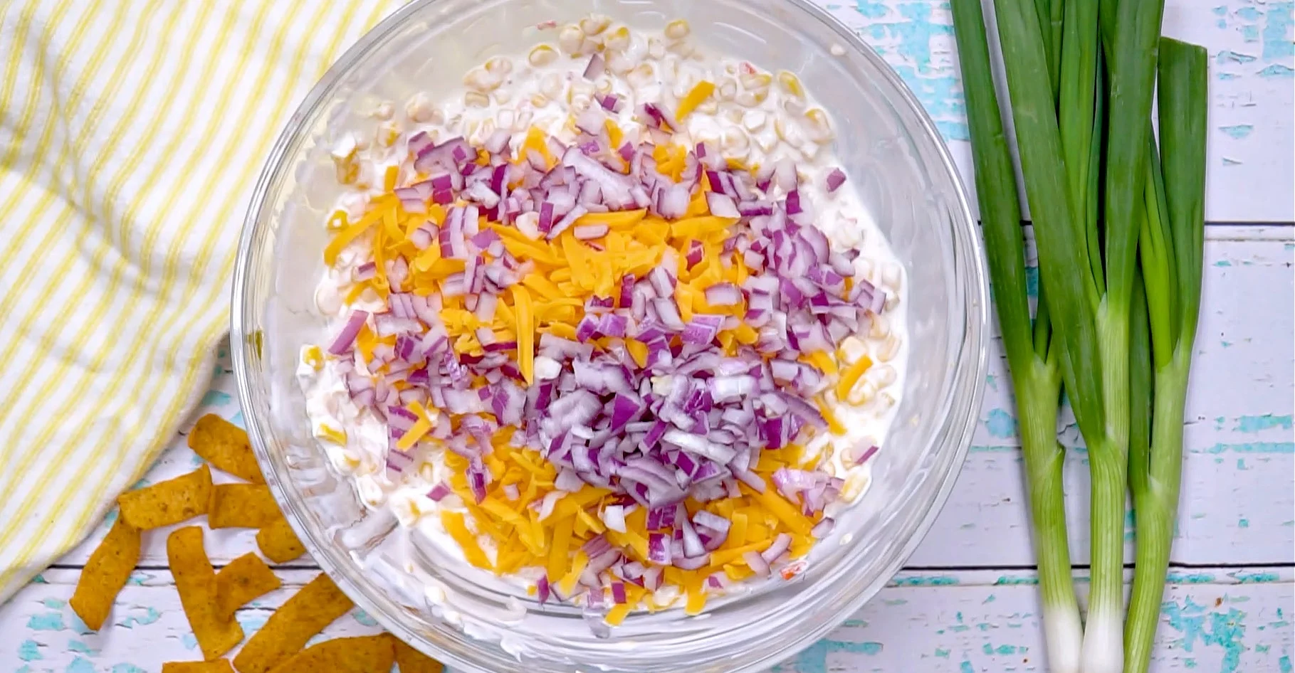 Onion and cheese being added.