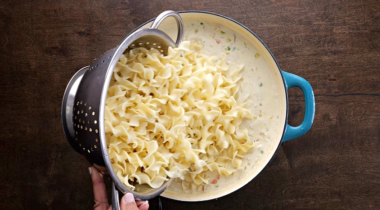 Adding noodles.
