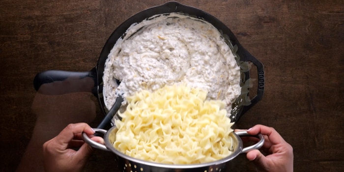 Adding the noodles.