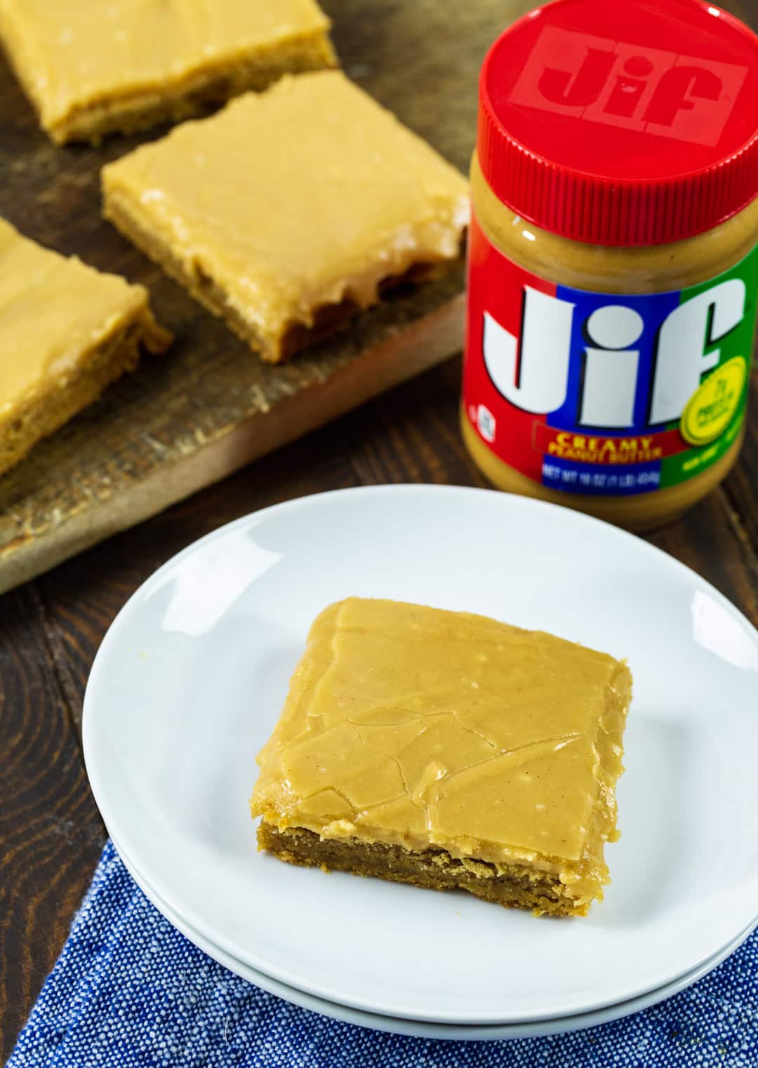Peanut Butter Brownies and a jar of peanut butter.