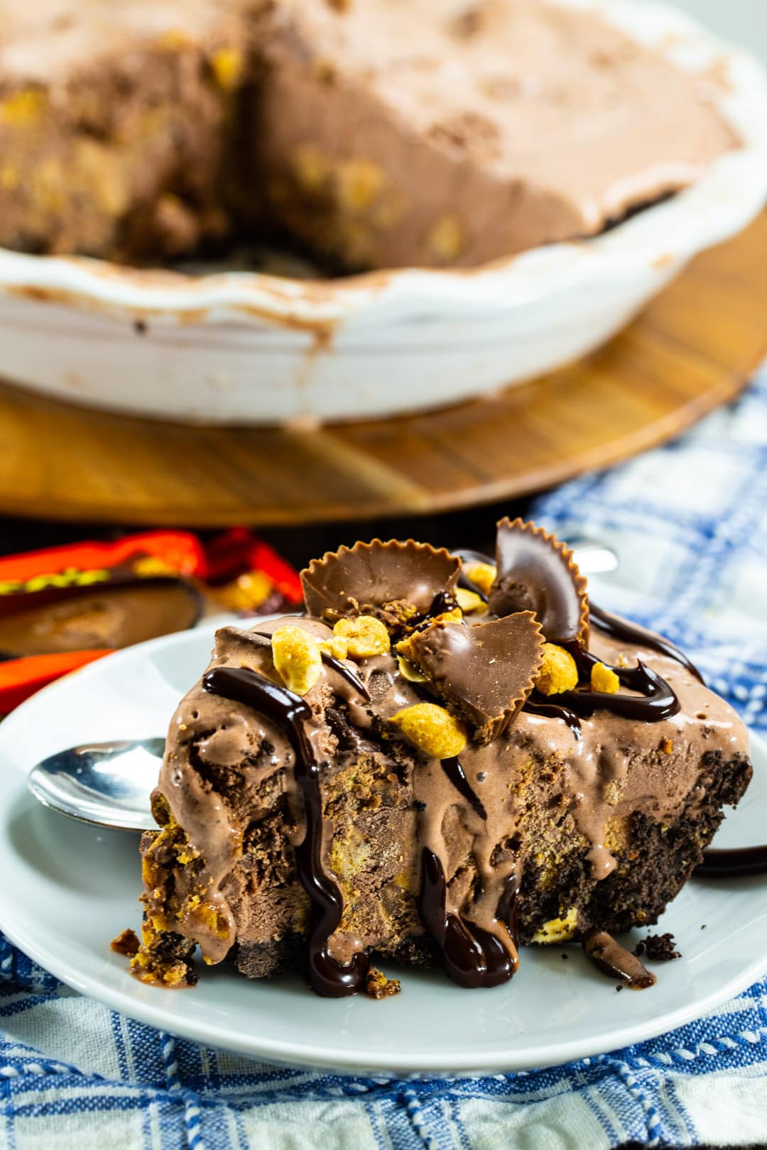 Slice of chocolate ice cream pie in oreo crust.