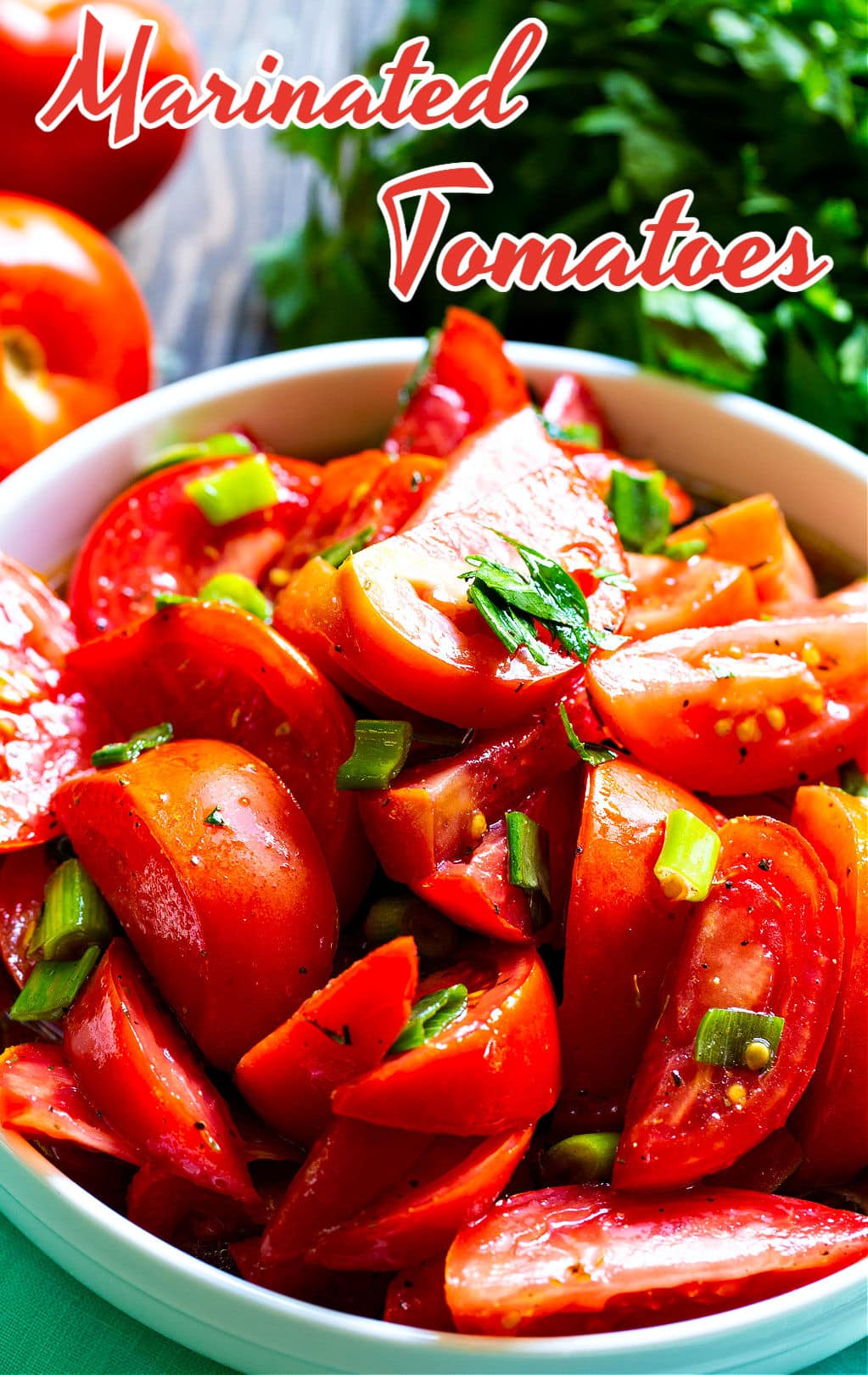 Marinated Tomatoes in a white bowl.