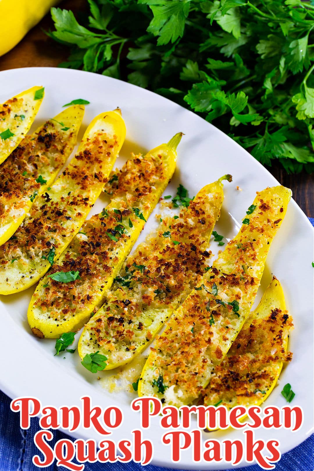 Squash planks topped with panko mixture on serving platter.