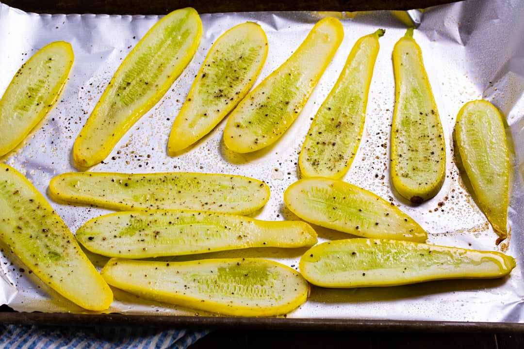 Squash slices on baking sheet.