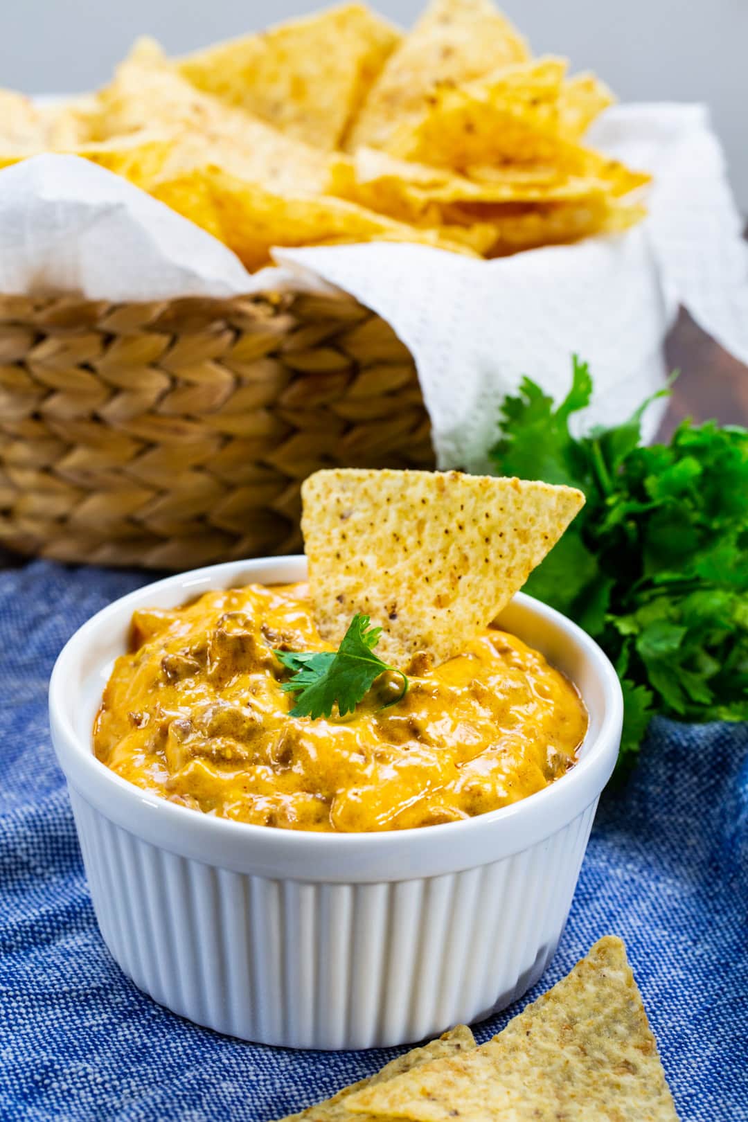 Slow Cooker Enchilada Dip in a white bowl.