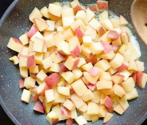Potatoes in skillet.