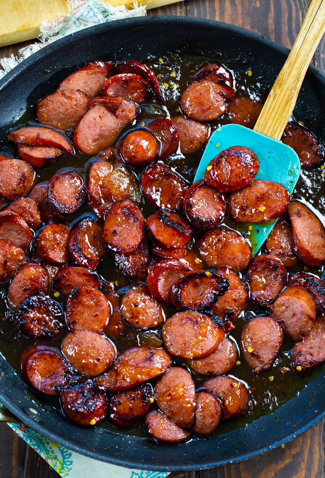 Spicy Peach Glazed Kielbasa in nonstick skillet.