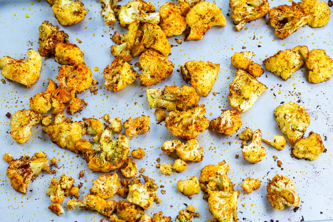 Roasted Cauliflower on a bakking sheet.