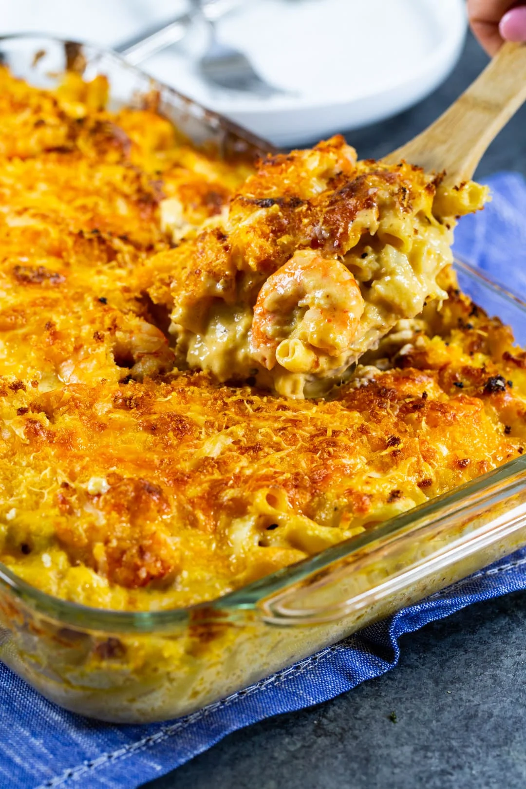 Spoon scooping mac and cheese.