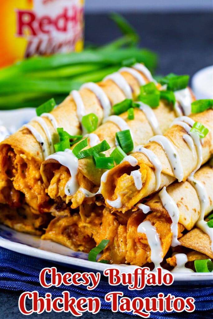 Cheesy Buffalo Chicken Taquitos piled on a plate.