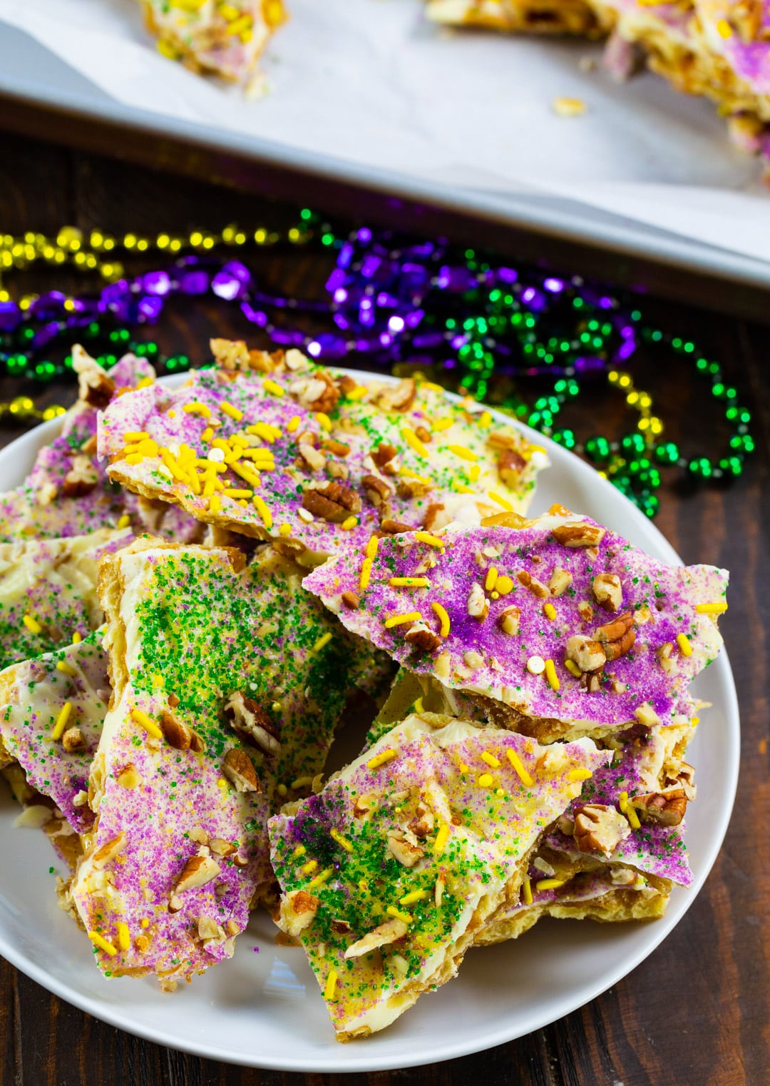 King Cake Cracker Candy on a plate.