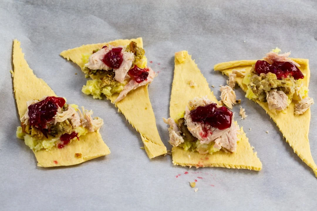 Filling on unbaked crescent dough.