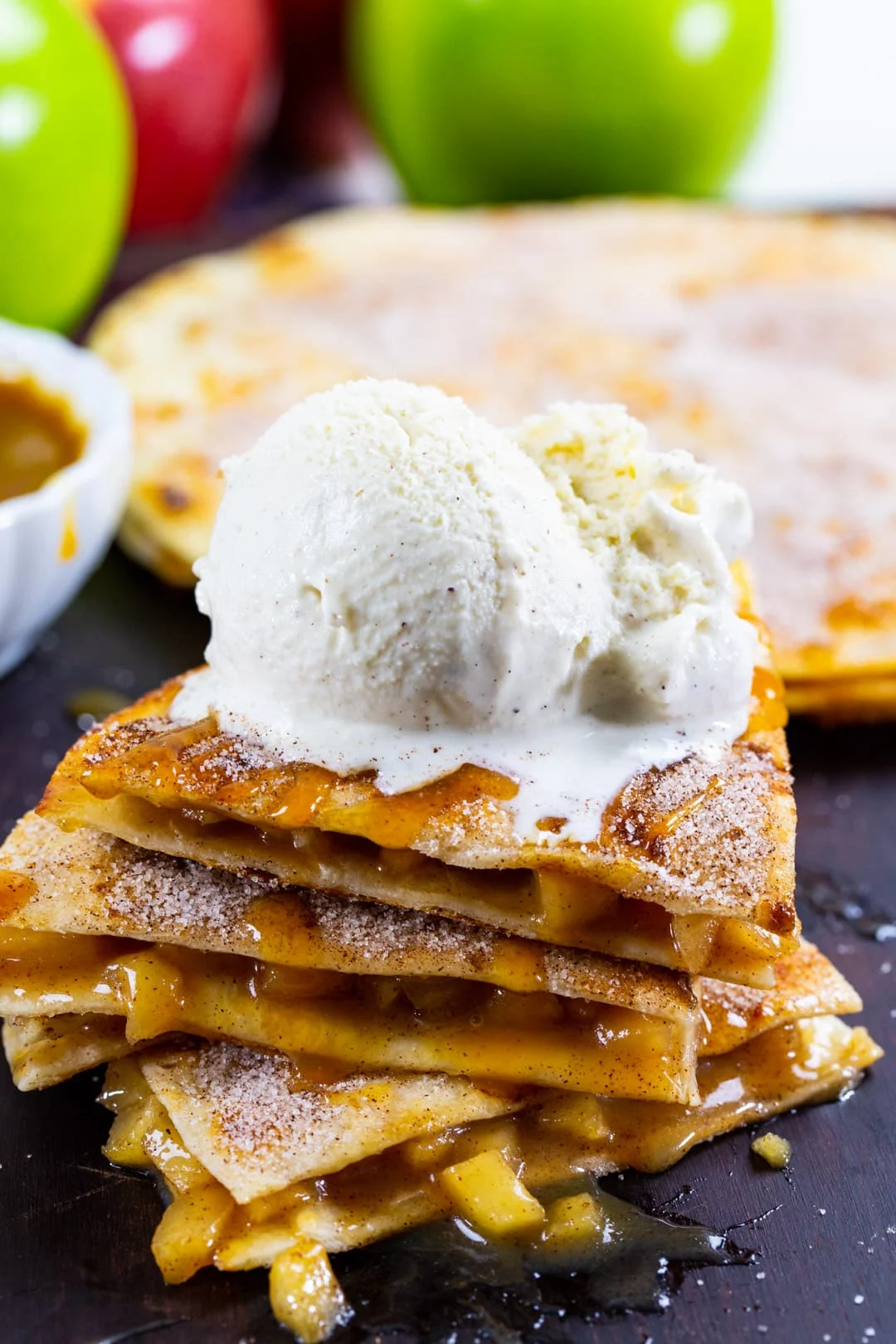Caramel Apple Quesadillas topped with vanilla ice cream.