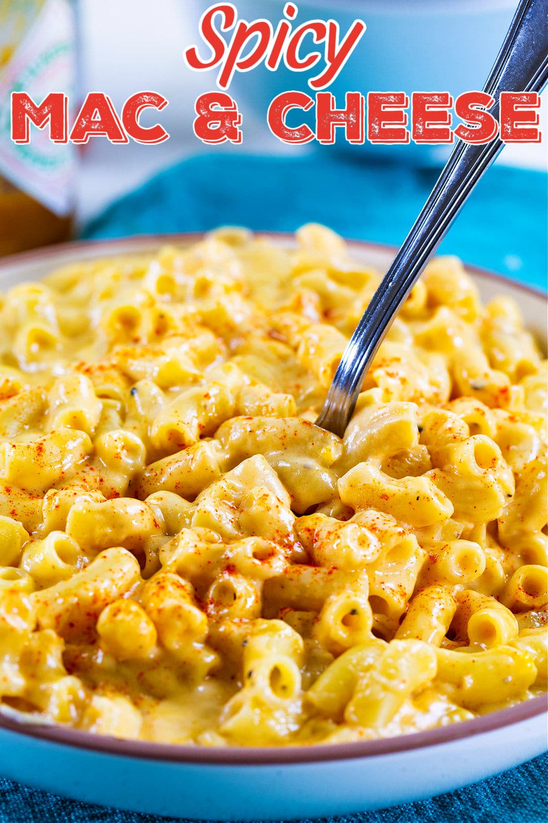 Fork lifting mac out of bowl.