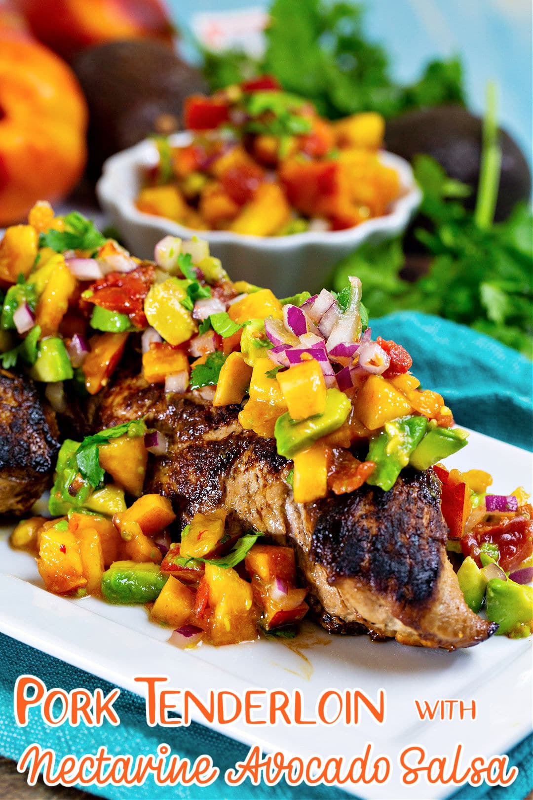 Whole pork tenderloin covered with fruit salsa.