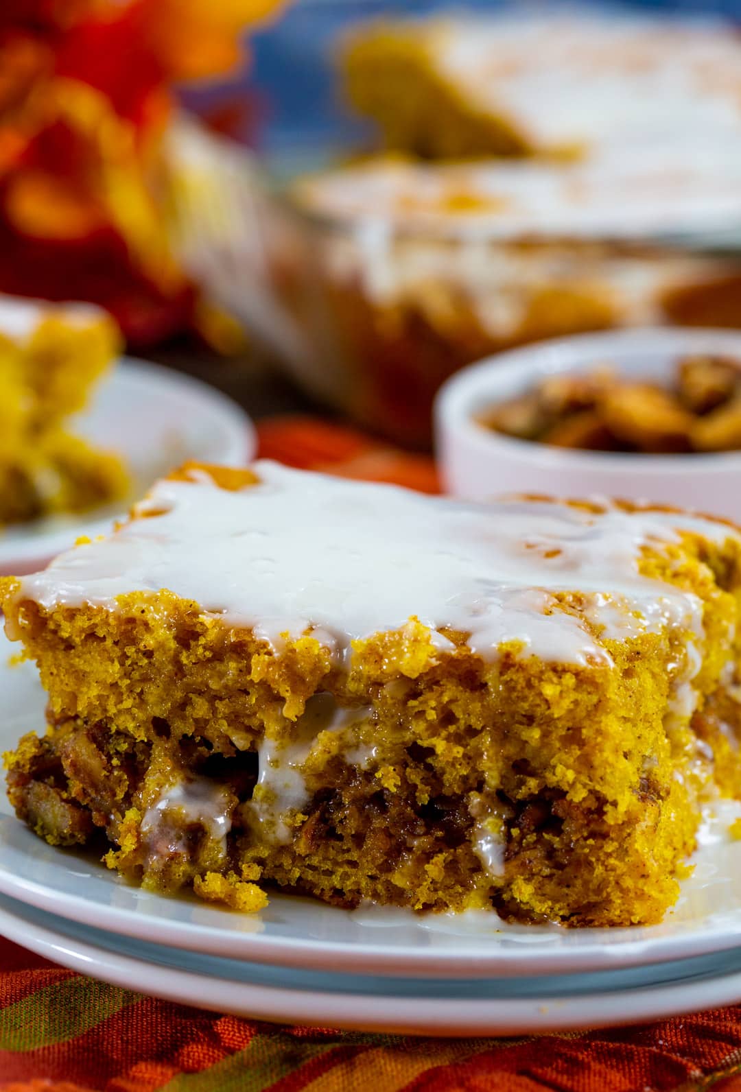 Piece of Pumpkin Honey Bun Cake on a small plate.