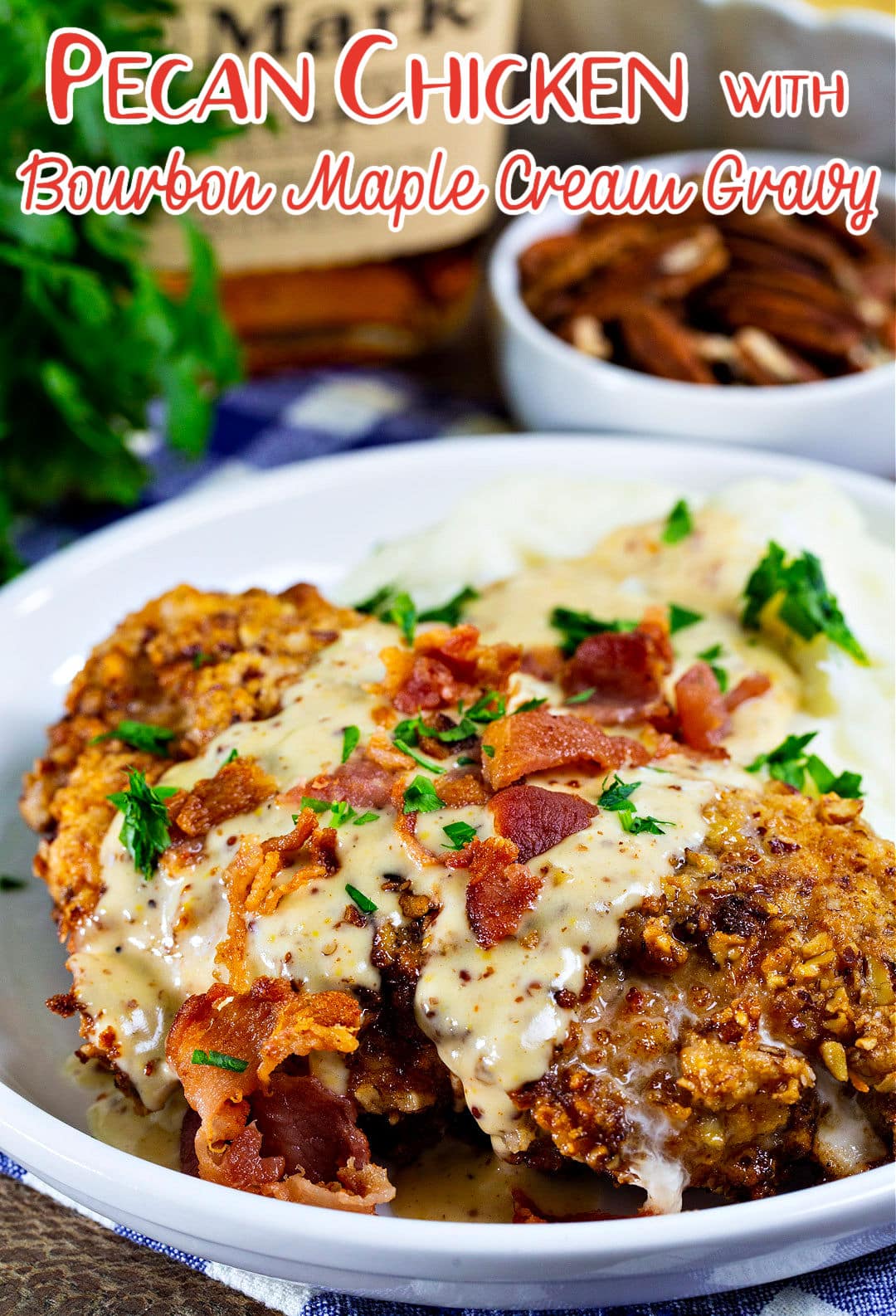 Pecan chicken covered in gravy and bacon.